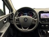 the interior of a car with a steering wheel, dashboard, and dash board