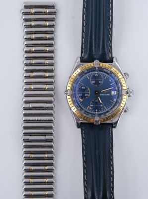 BREITLING. Montre bracelet Chronomat en acier et métal doré.