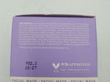 a box of facial mask on a white surface