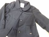 navy blue blazer jacket with gold buttons on the lapel and collar