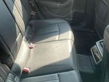 the interior of a car with black leather seats and black trims