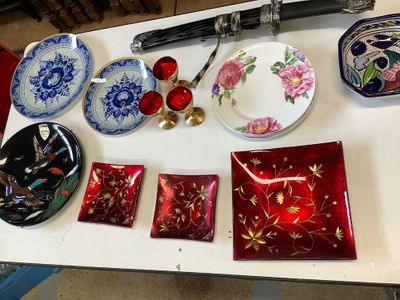 a table that has many different plates and bowls on it