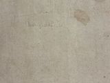 a piece of paper with writing on it sitting on a table