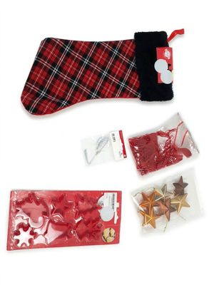a christmas stocking and other decorations on a white background