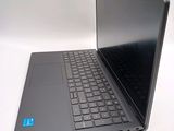 a laptop that is sitting on a white surface