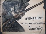 poster of a man holding a rifle in his right hand and a hat on his head