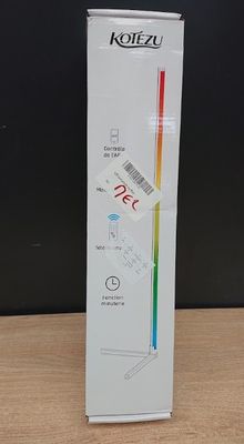 a white box with a sticker on it on a table