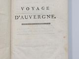 an open book with a black and white title on it