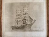 dessin d'un grand voilier dans un cadre accroché au mur