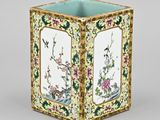 an image of a vase with a bird and flowers design on it