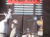 une vieille affiche de cinéma du film « Kill Me Again Again », avec John Dahl