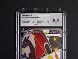 a close up of a pokemon card on a black surface