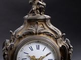 a clock that is sitting on top of a table