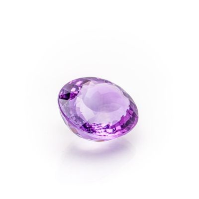 a purple amethorate gems on a white background