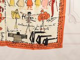 a tea towel with a drawing on it hanging on a wall