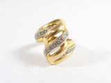 an image of a gold and diamond ring on a white surface