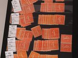 an image of a picture of a collection of stamps on a table