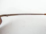 sunglasses with brown frames on a white surface with a white background