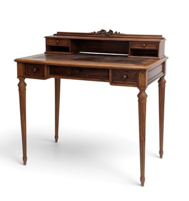 a wooden desk with a drawer on top of it