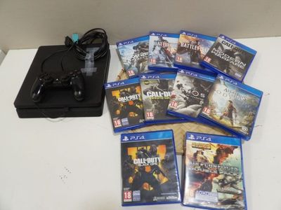 a lot of video games sitting on a table