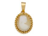 a gold plated pendant with a face of a woman on a rope
