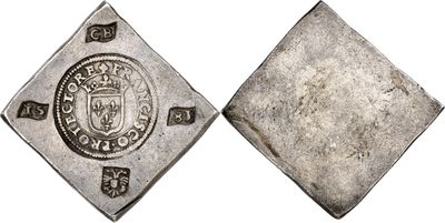 an old silver coin with a shield on the front and a shield on the back