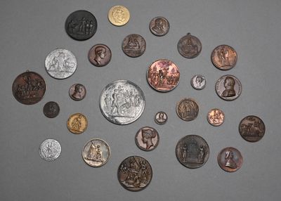 a lot of coins that are on the table