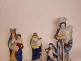 three figurines of the nativity of jesus, mary, joseph, and joseph