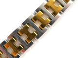 an image of a close up of a watch bracelet on a white surface