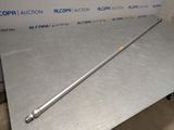 an image of a metal table with a metal rod on it