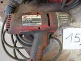 a corded drill and a corded cord on a table