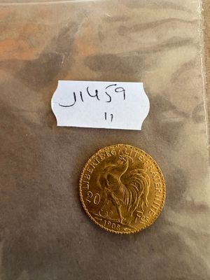 une pièce d'or et une pièce d'or dans un sac
