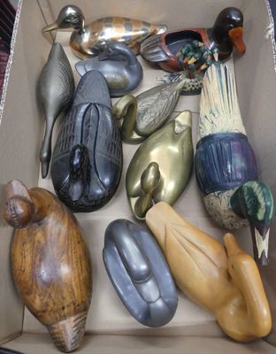 a cardboard box filled with assorted metal objects