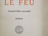 an old book with the title le feu written on it