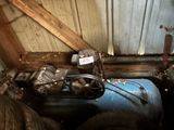 a blue tank sitting in the corner of a room