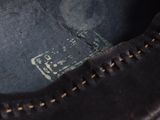 a close up of a pair of shoes that are on a table