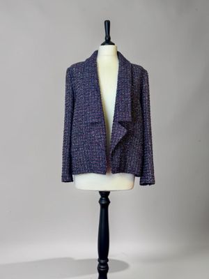 a close up of a mannequin mannequin with a jacket on it