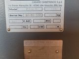 an image of a metal sign on the side of a machine