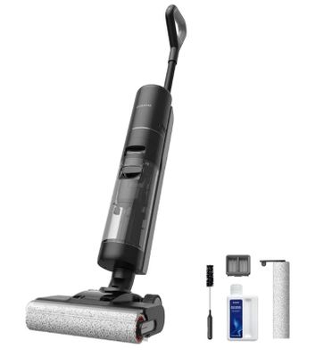 une photo en noir et blanc d'un aspirateur et de ses accessoires