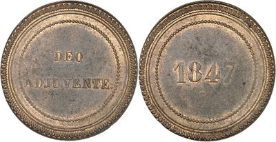 a close up of two old coins with the names of different countries on them