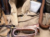 a bag with a bunch of items on top of it