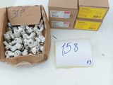 a box of nuts and a box of screws on a table
