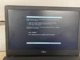 the laptop is sitting on the table with the program displayed on the screen