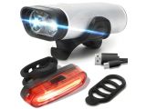a bike light that is sitting next to a usb charger