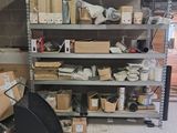 a room with a lot of boxes and boxes on the shelves