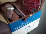 a cardboard box that has a bunch of items inside of it