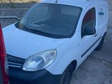 a white van that is parked next to a black van