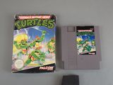 an image of a nintendo game with a box of teenage mutant turtles