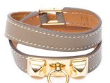 bracelet en cuir avec fermoir plaqué or et clous carrés