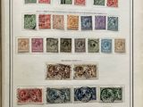 an open book with a bunch of different stamps on it